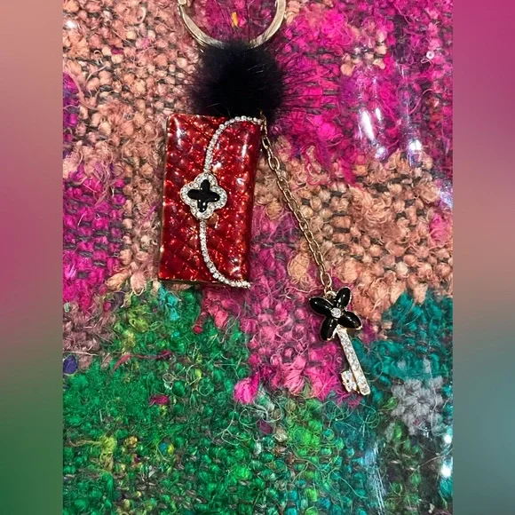 Elegant Red Keychain with Gold Accents - Picture 2 of 3